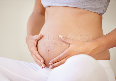 Buy stock photo Stomach, love or hands of pregnant woman with belly growth, care or maternal bond closeup. Future mother, zoom or abdomen for child development, utero or pregnancy support and waiting for motherhood