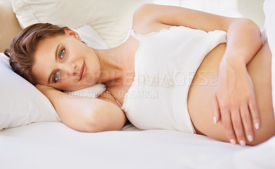 Buy stock photo Pregnant woman, love stomach and portrait on bed with relax wellness and mindfulness for prenatal care. Person, smile face and connect for pregnancy gratitude, rest and maternity touch in apartment