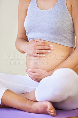 Buy stock photo Pregnant woman, touch stomach and fitness in studio with relax wellness and exercise for prenatal care. Person, yoga mat and connection with fetus, lamaze class and maternity love with healthcare
