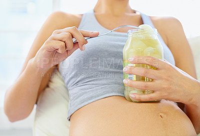 Buy stock photo Pregnant woman, pickled onions and eating in bedroom with craving for vegetable nutrition in house. Maternity, person and prenatal snack with fermented food for wellness and probiotics in apartment