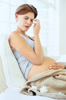 Buy stock photo Crying, tissue and pregnant woman in a bed with depression, worry or fear for the future at home. Maternity, anxiety or person in bedroom with pregnancy mood swings, hormones or overwhelmed in house