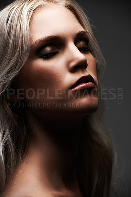 Buy stock photo Closeup of a beautiful young woman in the studio