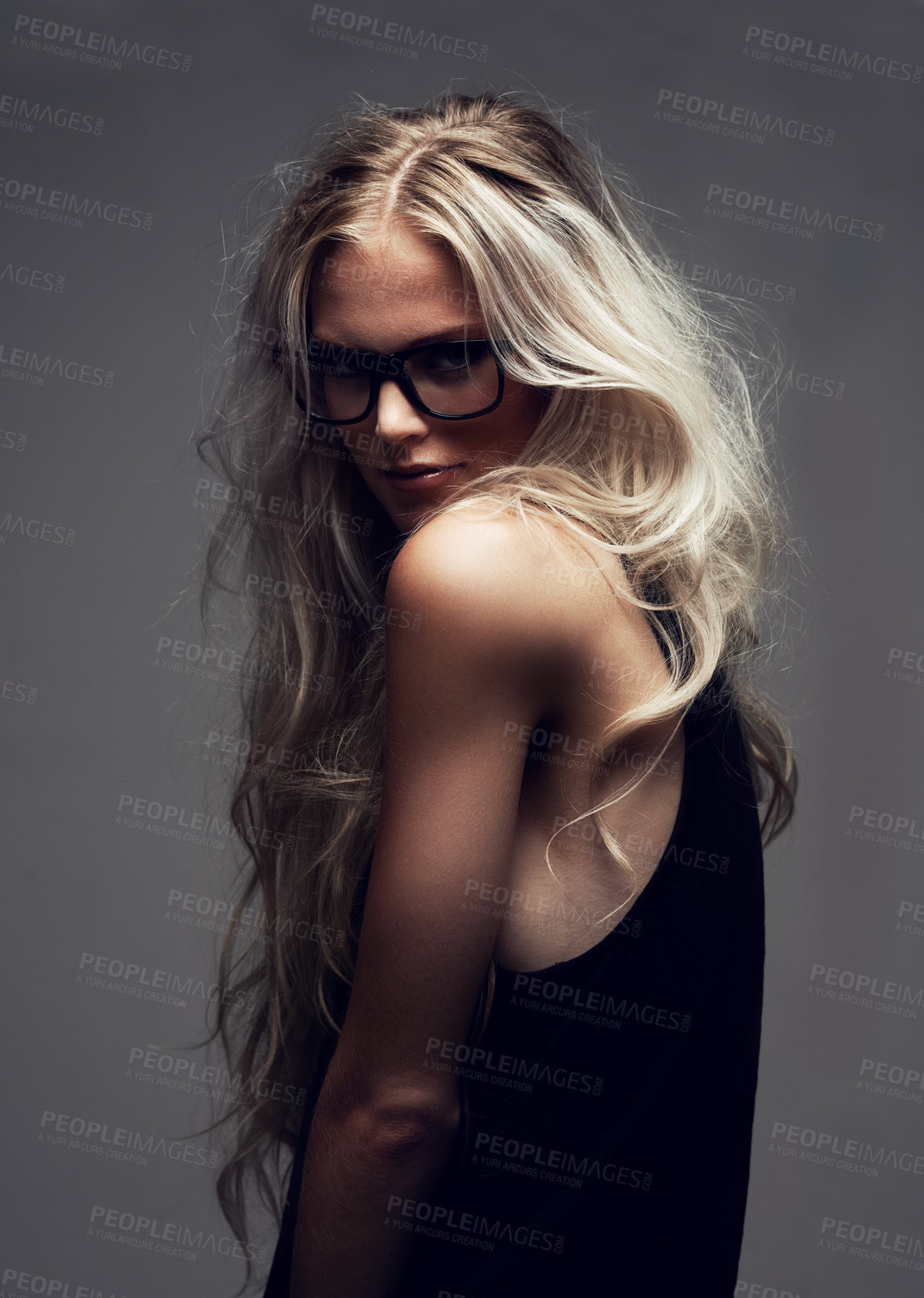 Buy stock photo Portrait, woman and glasses in studio with fashion, style and trendy aesthetic with positive by gray background. Model, pride and eyecare on face with attitude, blonde and cool in sunglasses