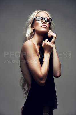 Buy stock photo Portrait of a gorgeous young woman posing in the studio