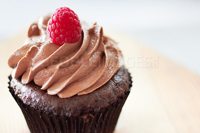 Buy stock photo Cropped shot of a freshly baked cupcake