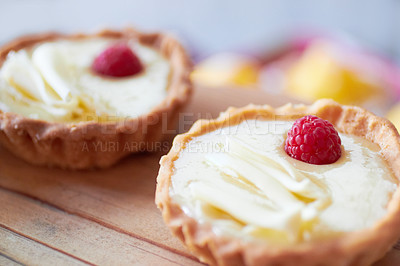 Buy stock photo Cream tart closeup, dessert and bakery with cake and sweet treat on wooden table. Pastry, catering and hospitality industry with food, baked goods and custard confectionery, rich snack and fresh bake