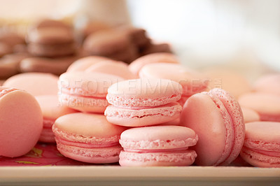 Buy stock photo Cropped shot of a fresh batch of pink macaroons