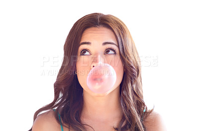 Buy stock photo An attractive young woman blow bubbles with gum