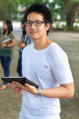 Buy stock photo Asian man, college student and tablet in outdoor portrait with smile for study, education and social media app. Japanese gen z person, digital touchscreen and learning at university, campus or school