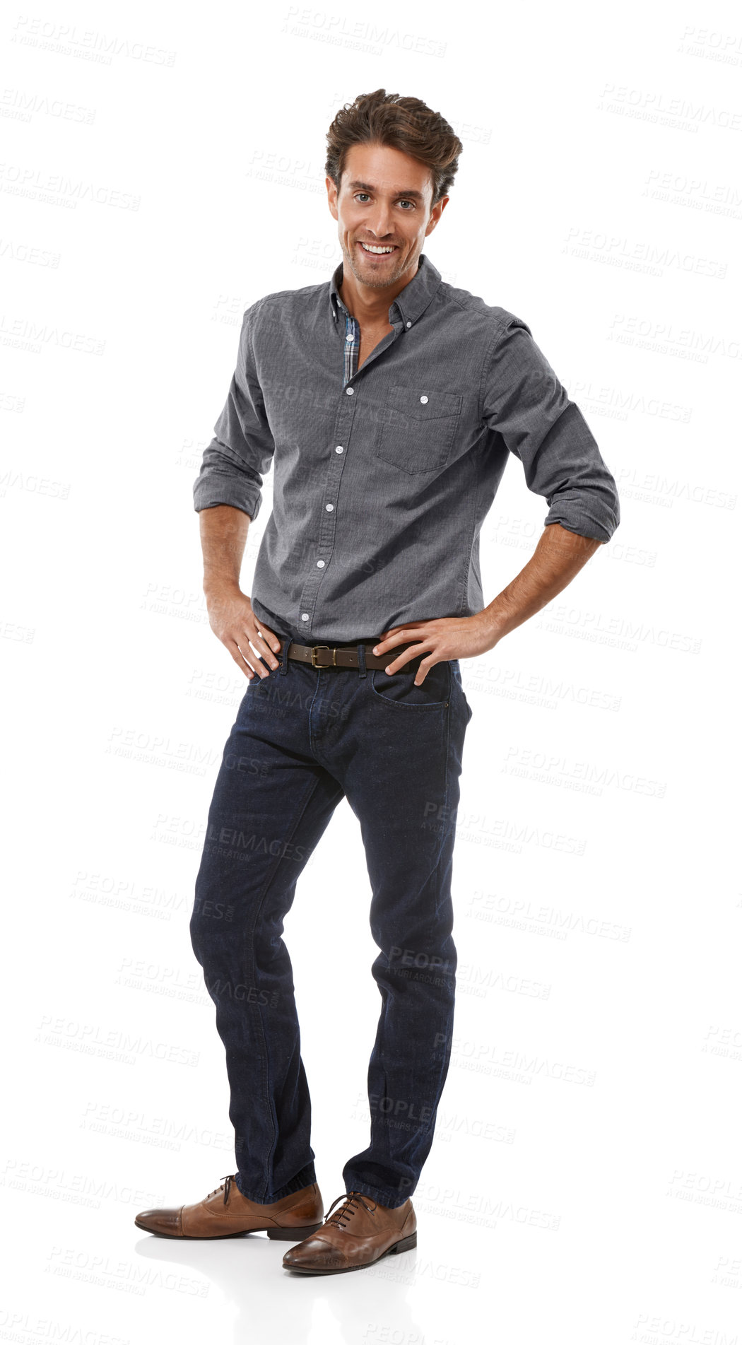 Buy stock photo Happy, entrepreneur and portrait of man in studio, white background or confident in professional style. Businessman, smile or hands on hips with jeans, fashion or person with pride for work or career