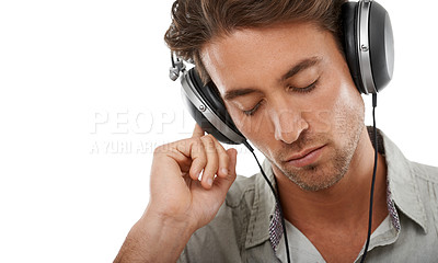 Buy stock photo Man, headphones and calm music in studio for audio subscription, streaming multimedia and radio on white background. Face of model listening to peaceful podcast, hearing sound or song at mockup space