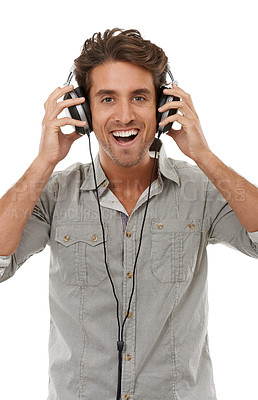 Buy stock photo Man, headphones and portrait with smile in studio for music, audio subscription and multimedia sound on white background. Excited model streaming radio, hearing podcast and listening to digital song