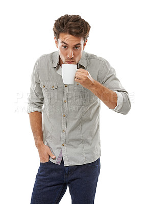 Buy stock photo Man, coffee and drink in studio, fashion and thinking with blowing steam with ideas by white background. Guy, model and person with hot tea cup, latte or espresso with thinking in trendy clothes