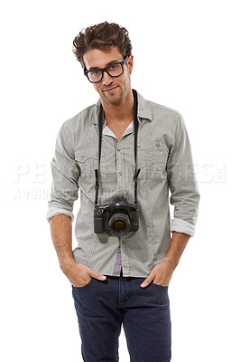 Buy stock photo Portrait, confident man and photographer with camera on neck in studio isolated on a white background in Spain. Person in glasses, creative paparazzi and fashion style of model with hands in pocket
