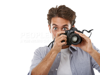 Buy stock photo Photographer man, camera and click in studio with portrait, shooting or mockup space by white background. Reporter person, newspaper employee or journalist in media, paparazzi or photoshoot for story