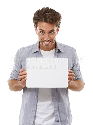 Buy stock photo Portrait, sign and happy man on poster, advertising and mockup space isolated on a white studio background. Face, paper and person show banner on promotion, info or blank billboard presentation offer