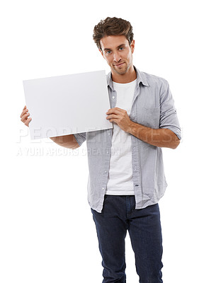 Buy stock photo Poster, mockup and portrait of man with sign, presentation and communication of announcement in white background. Blank, placard and person advertising in studio, space and billboard for news or info