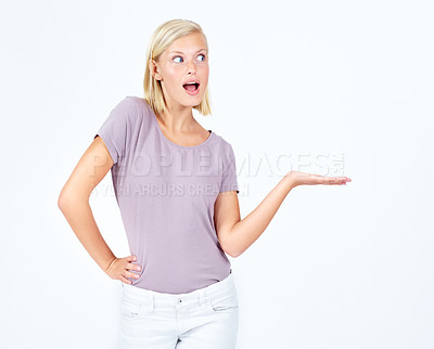 Buy stock photo Woman, wow or showing hand at marketing space, advertising mock up or product placement mockup. Model, hand gesture and surprised promotion for sales deal, winner goals or target on studio background