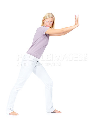 Buy stock photo Portrait, push and mockup with a woman in studio on a white background trying to move advertising or marketing space. Pushing, effort and heavy with an attractive young female moving blank space