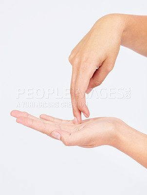 Buy stock photo Hands, mockup and fingers walking on a palm in studio on a white background for direction or navigation. Social media, emoji and gesture with a female hand taking a walk or step on blank space