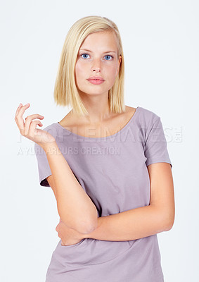 Buy stock photo Woman, portrait or attitude pose on studio background in assertive, serious or confidence facial expression. Model, body language or casual fashion clothes on white mockup backdrop on marketing space