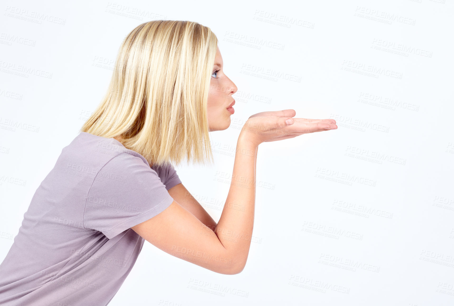 Buy stock photo Flirting profile and air kiss of girl contemplating, thinking and thoughtful for advertising. Attractive flirt and affection of isolated model blowing kisses on white background mock up.
