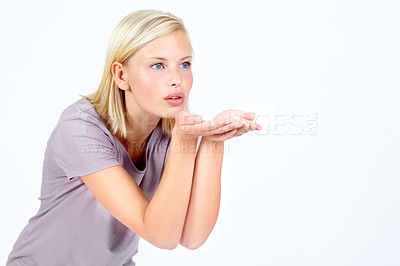 Buy stock photo Flirt, thinking and woman with air kiss contemplating, pondering and thoughtful for advertising. Attractive, flirting and affection of isolated model blowing kisses on white background mock up.