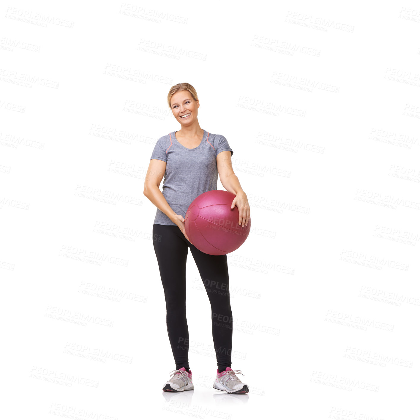Buy stock photo A beautiful young woman in gymwear holding a medicine ball