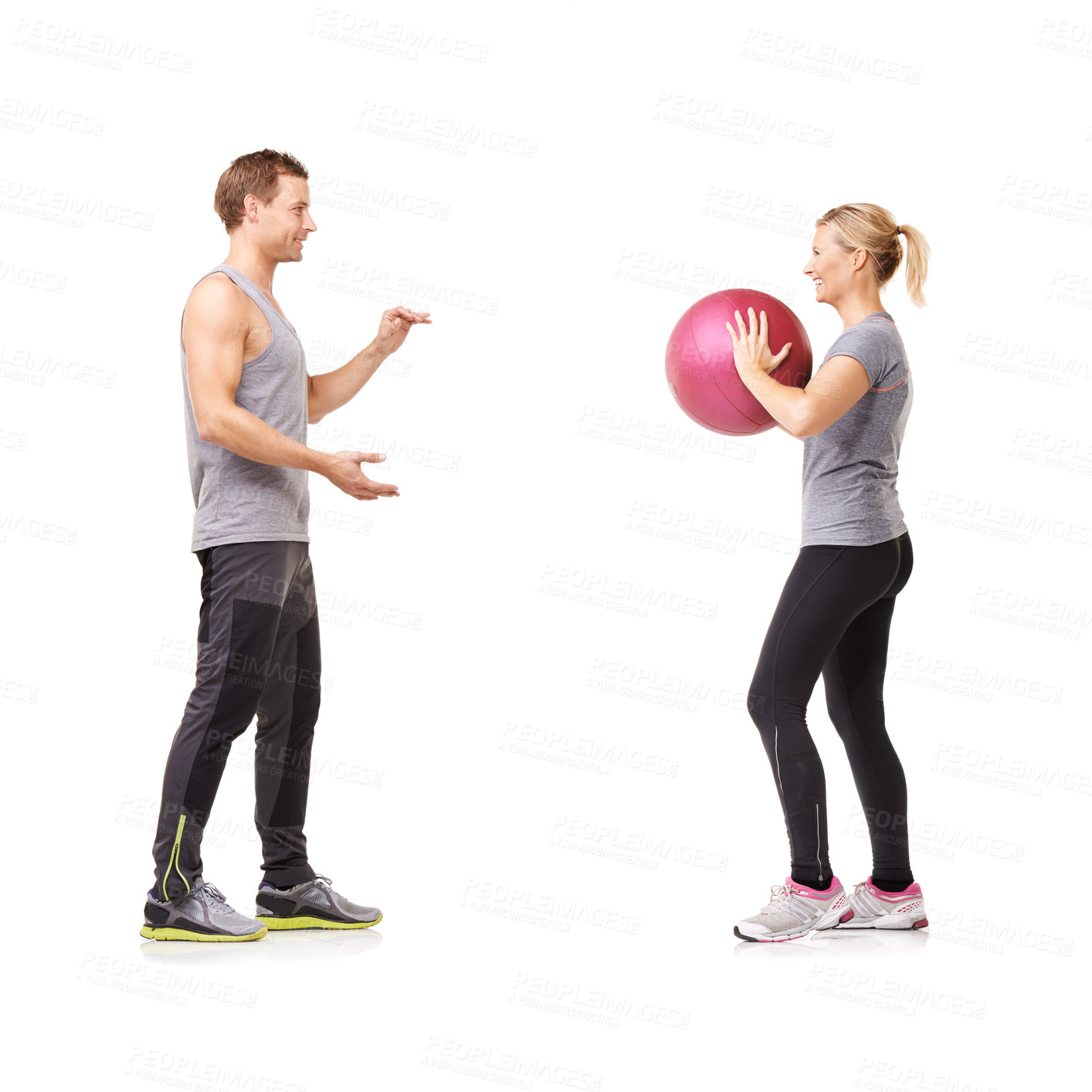 Buy stock photo Couple in studio with fitness, gym ball and coaching for exercise, body wellness and advice. Sports workout, man and woman with sphere for balance, training and personal trainer on white background.