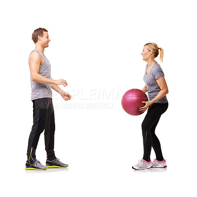Buy stock photo Coaching, man and woman with medicine ball for fitness in studio, body wellness or support. Sports workout, fit girl and personal trainer with sphere for balance, training and gym on white background