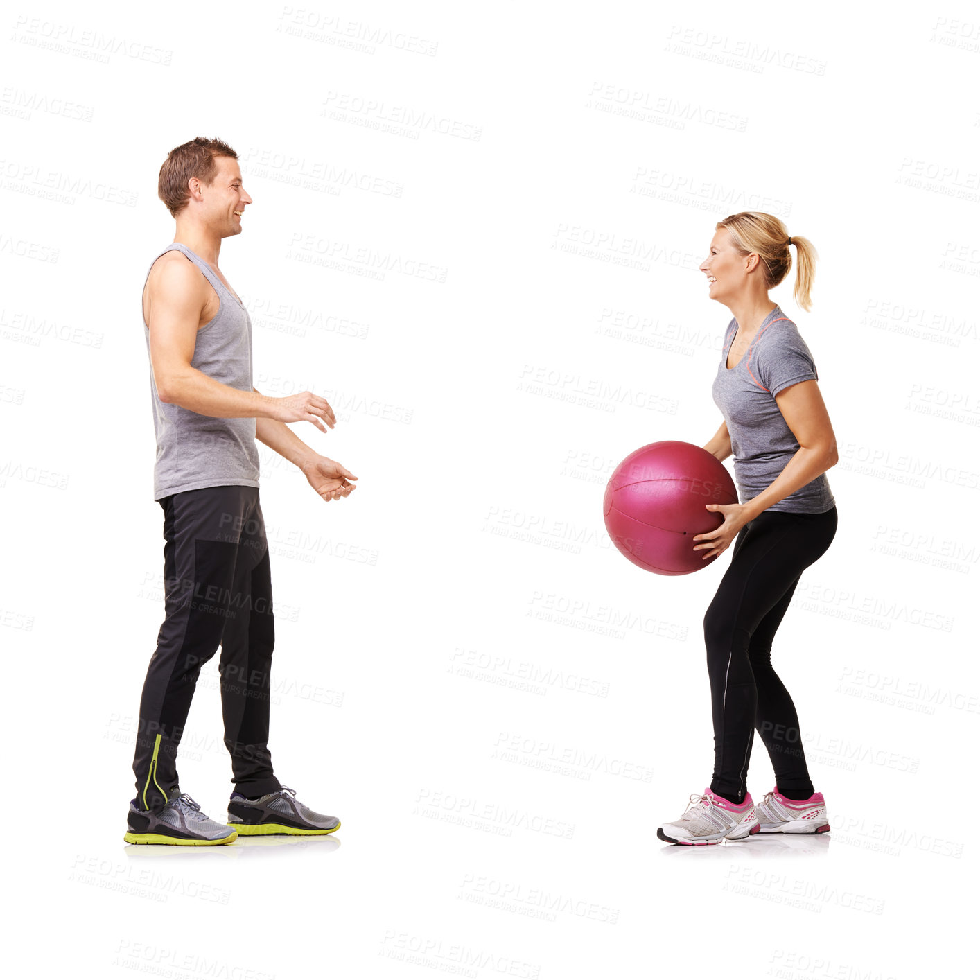 Buy stock photo Coaching, man and woman with medicine ball for fitness in studio, body wellness or support. Sports workout, fit girl and personal trainer with sphere for balance, training and gym on white background