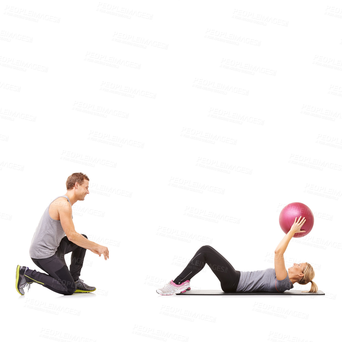 Buy stock photo Coaching, man and woman with medicine ball for fitness in studio, body wellness and support. Sports workout, girl and personal trainer with sphere for balance, training and power on white background.