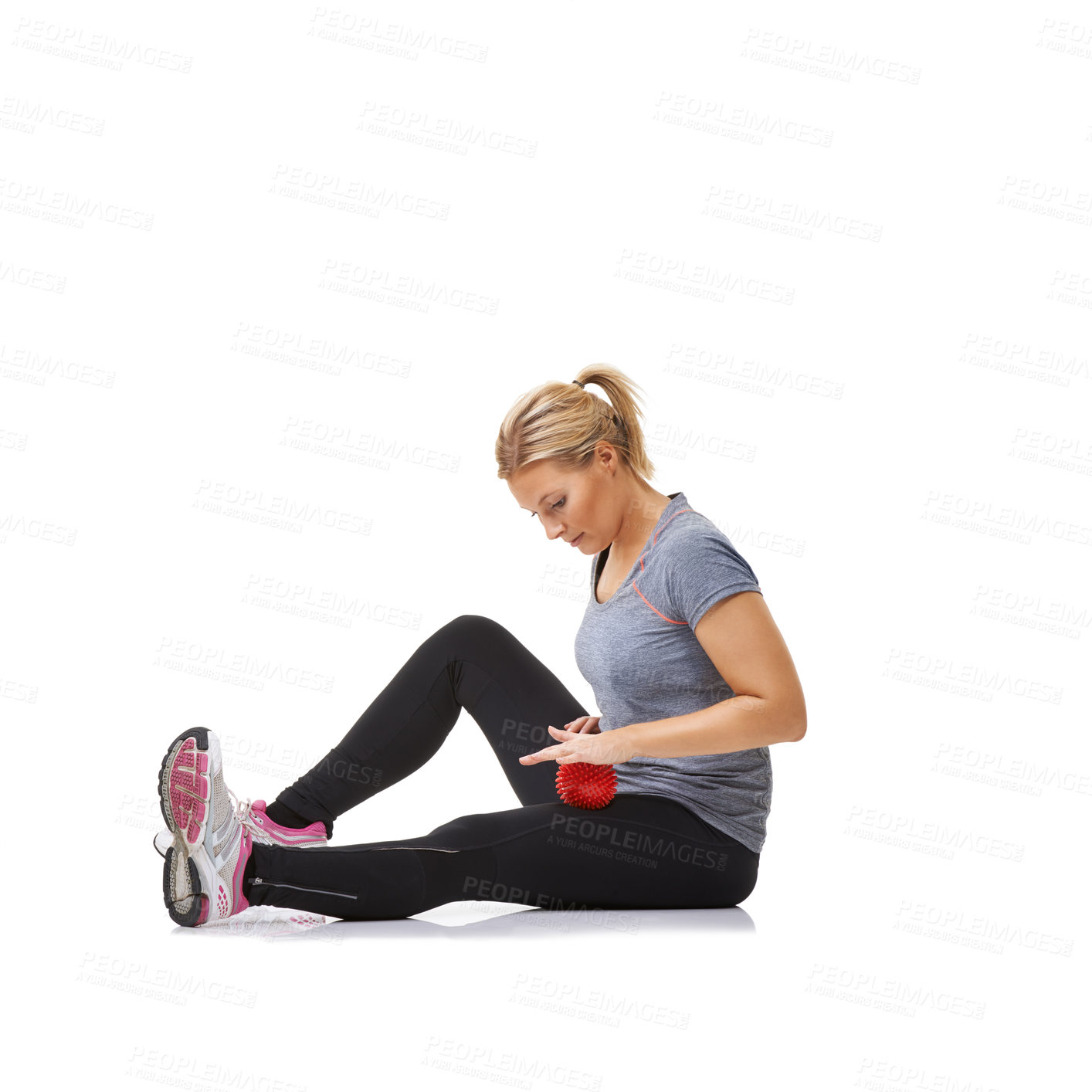 Buy stock photo Woman, massage ball and healing body or physical therapy, injury and health or wellness by white background. Female person, athlete and studio or rehabilitation for muscles in legs and body in mockup
