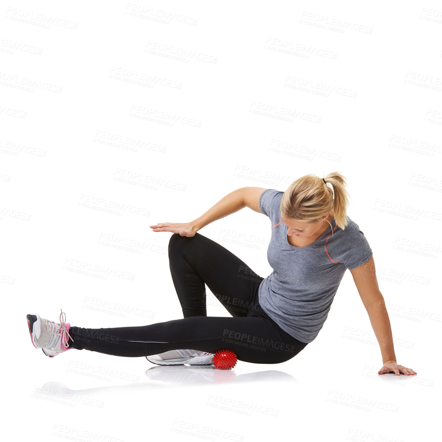 Buy stock photo Massage ball, woman pain and leg physio for fitness, workout and sport training injury in studio. Health, stretching and exercise equipment with person bruise and wellness with white background