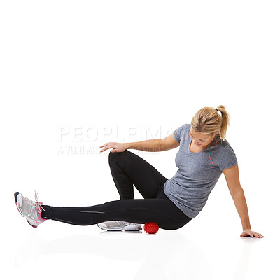 Buy stock photo Woman, massage ball and physical therapy in studio, injury and health or wellness by white background. Female person, athlete and healing or rehabilitation for muscles in legs and body in mockup