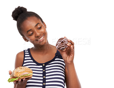 Buy stock photo Black girl, decision and donut with sandwich, smile and nutrition isolated on a white studio background. African person, mockup space and model with sweet snack, choice and comparison with wellness