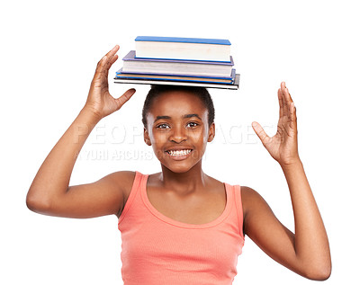 Buy stock photo Portrait, happy and black girl with books on her head, education and balance isolated on white studio background. Face, African person and model with mockup space and learning with knowledge or smile