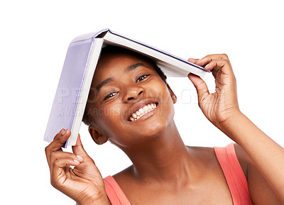 Buy stock photo Portrait, knowledge and black girl with book on her head, education and balance isolated on a white studio background. Face, African person and model with mockup space and learning with student