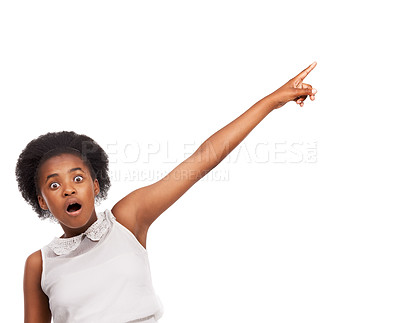 Buy stock photo Surprise, pointing and portrait of black girl in studio with mockup space for marketing or advertising. Shock, sale and African child with wow, omg or wtf face expression isolated by white background