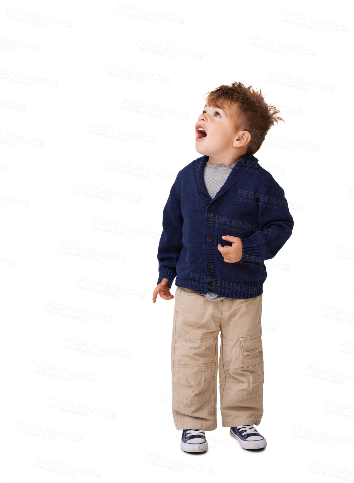 Buy stock photo A cute little boy looking up with an expression of amazement