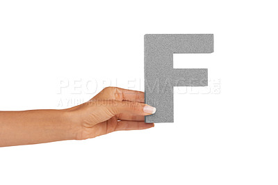 Buy stock photo Hands, capital letter and F in studio for alphabet, font sign or learning english language on white background. Closeup, woman or text design, typography or character of grammar, teaching or spelling