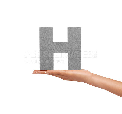 Buy stock photo Hand of woman, capital letter H and presentation of consonant isolated on white background. Character, font and palm showing English alphabet typeface for communication, reading and writing in studio