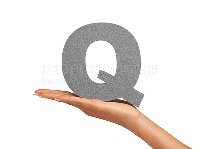 Buy stock photo Woman, hand and letter Q or font in studio for advertising, learning or teaching presentation. Sign, alphabet or character for marketing, text or communication and grammar symbol on white background