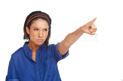 Buy stock photo Woman, pointing and angry in studio or white background for frustrated protest, judge fail or mockup space. Female person, model and hand gesture for unhappy glare or bad news, opinion or upset blame