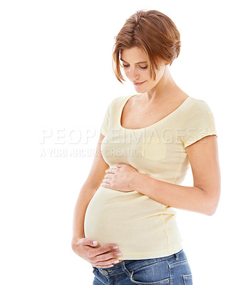 Buy stock photo Woman, pregnant and studio with hands on stomach with smile, thinking and love by white background. Pregnant woman, future mother and belly with care, vision and wellness while isolated in pregnancy