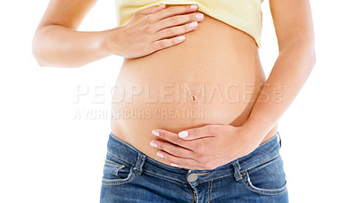 Buy stock photo Pregnant woman, stomach and hands with studio background for body, maternity wellness and healthcare. Closeup abdomen, beauty and pregnancy of mother for skincare, healthy life and white background 