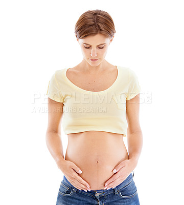 Buy stock photo Pregnant woman, white background and touch stomach, body and maternity for wellness, hope and healthcare. Abdomen, beauty and pregnancy of mother on studio background, skincare or healthy dermatology