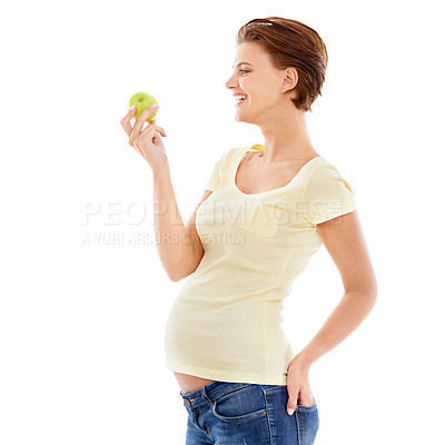 Buy stock photo Happy, pregnant and health of woman with apple for wellness, diet and nutrition marketing. Cheerful smile of pregnant woman holding fruit for healthy lifestyle snack with white studio mockup