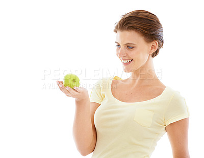 Buy stock photo Diet, health and woman with an apple in a studio for nutrition, wellness and healthy weightloss. Natural, beauty and female model holding a fruit while isolated by white background with mockup space.