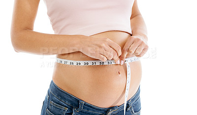 Buy stock photo Pregnancy, measuring tape and woman stomach in studio to check growth, development and health on mockup. Abdomen, wellness and pregnant woman self care, diet and healthy progress on white background
